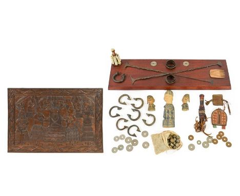 A Collection of Early 20th Century West African Artefacts, comprising currency including manillas, two Kissi pennies, British