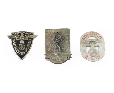 A German Third Reich NSKK Arm Badge, in aluminium with blackened field for Traffic Education; two Aluminium Arm Badges, one s