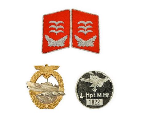 A Pair of German Third Reich Luftwaffe Flak Artillery Hauptmann's Collar Tabs, in red wool embroidered with three rank gulls 