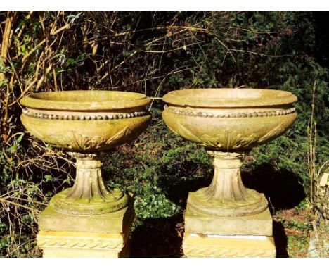 Garden pots and urns: A pair of Pulham stoneware urns, late 19th century, stamped Pulham’s terracotta Broxbourne, 61cm highPa