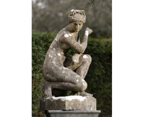 Garden statues: After the Antique: An Austin and Seeley composition stone figure of the crouching Venus, mid 19th century, 94