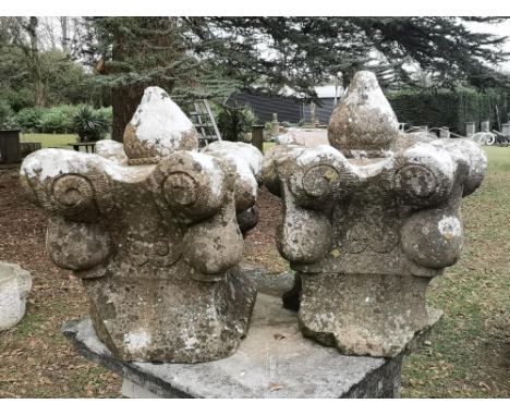 Gate piers and Finials: A pair of carved Kilkenny marble gate pier tops, 18th/19th century, 64cm highSee footnote to previous