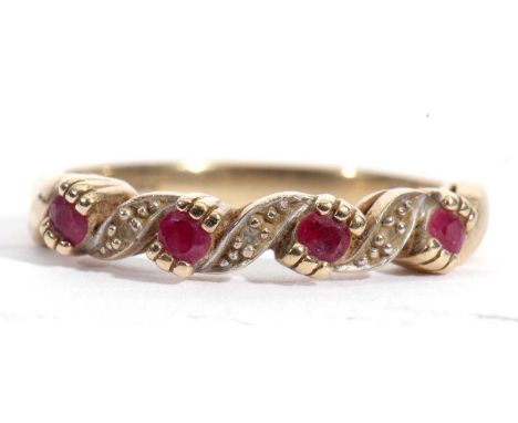 Modern 9ct gold ruby an diamond ring, a Celtic design featuring four small rubies highlighted between with three small diamon