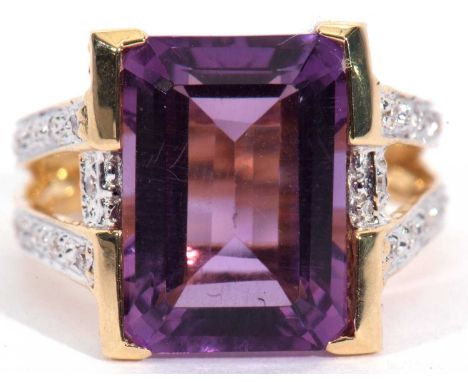 Modern amethyst and diamond ring, the rectangular shaped amethyst 14 x 9 x 6mm approx, the sides bezel set and raised between