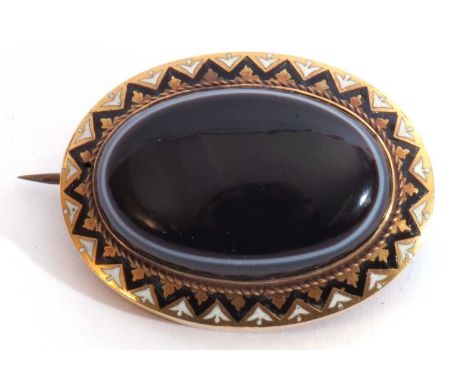 Victorian gold agate and enamel mourning brooch, the large oval shaped banded agate 26 x 12mm raised within a black and white