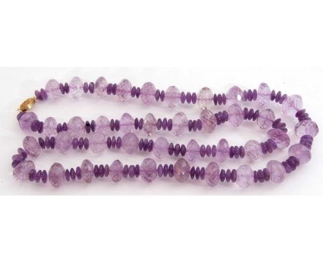 Large amethyst bead necklace, a single row of faceted and polished beads to a silver gilt clasp, 42cm fastened