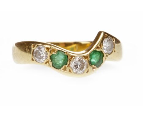 GREEN GEM AND DIAMOND RINGshaped to fit around another ring, with three round brilliant cut diamonds totalling approximately 