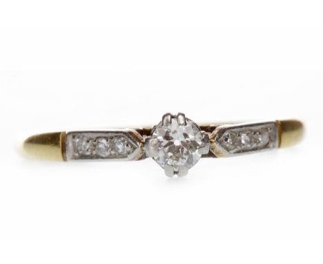 EARLY TWENTIETH CENTURY DIAMOND SOLITAIRE RINGwith a double four claw set round brilliant cut diamond of approximately 0.11 c