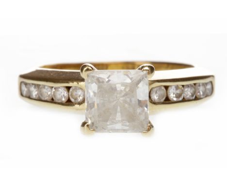 NINE CARAT GOLD GEM SET RINGset with a square white gem 6.5mm long, on gem set shoulders, size M, 4.2g