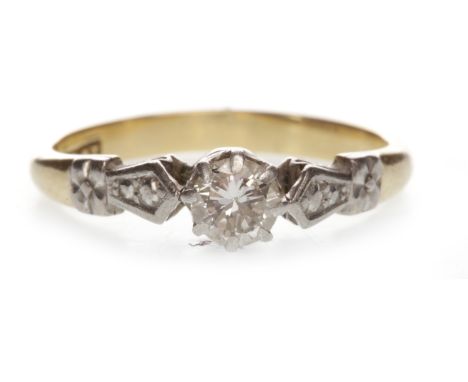 ART DECO DIAMOND SOLITAIRE RINGwith an eight claw set round brilliant cut diamond of approximately 0.30 carats, on moulded sh