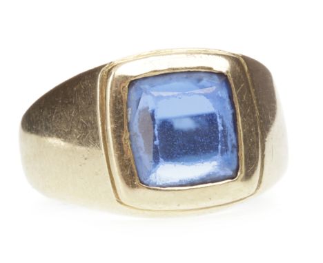GENTLEMAN'S PASTE SET SIGNET RINGset with a square step cut paste 8.8mm wide to a broad tapered band, marked 14K, size T, 9.5