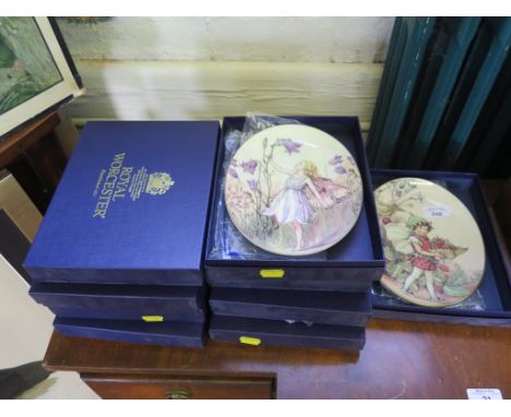 A set of nine Royal Worcester oval plates from Flower Fairies series 21.5cm high, all boxed