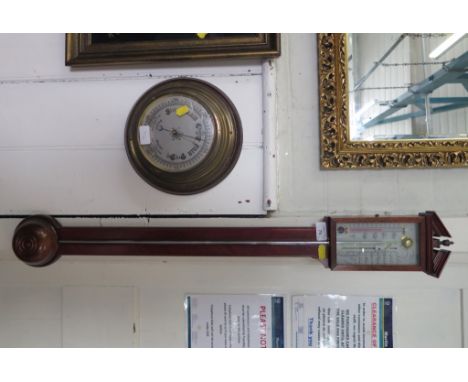 *A George III style mahogany stick barometer with mercury scale and alcohol thermometer 97cm long and an aneroid barometer (2