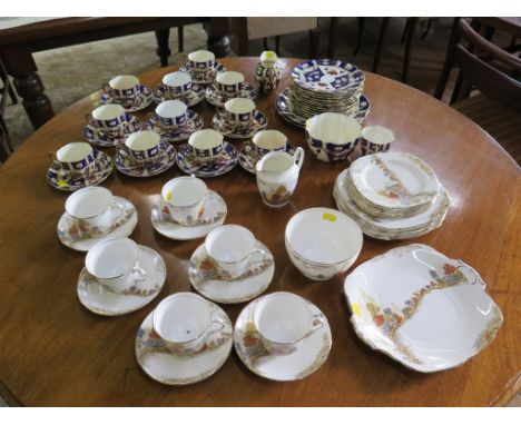 A Royal Stafford gardens design part tea service, 27 pieces and an Aynsley and others Imari patterm part tea service