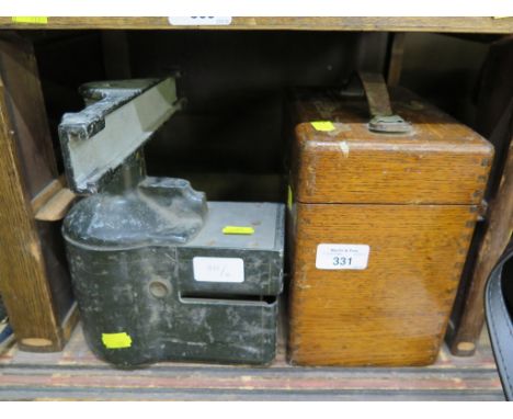 A 'Measuregraph', a pigeon timer with oak case, a Decca Picnic Gramophone and an iron foot scraper (4)