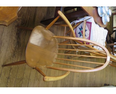 A set of four Ercol Windsor Quaker dining chairs, including two carvers, and two other Ercol dining chairs (6)