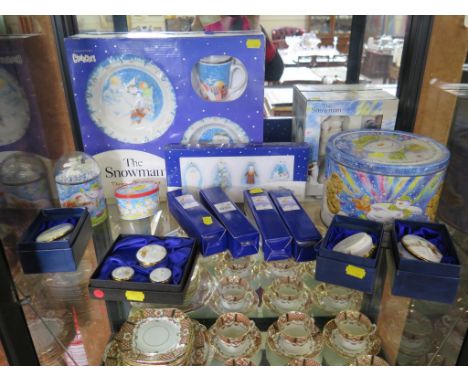 Royal Doulton and Coalport figures, snow globe, mugs and breakfast wares from The Snowman series by Raymond Briggs, also limi