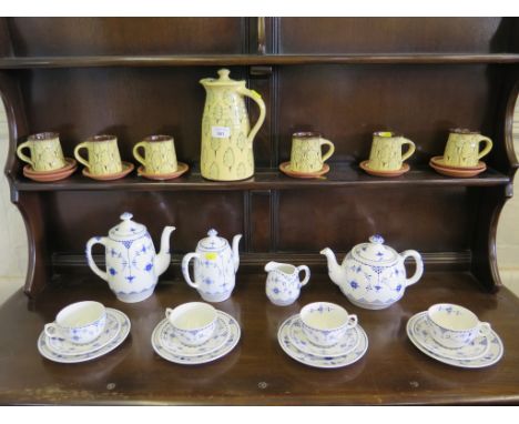 A Furnivals and Masons Denmark pattern part tea service, and slip ware coffee service with leaf decoration