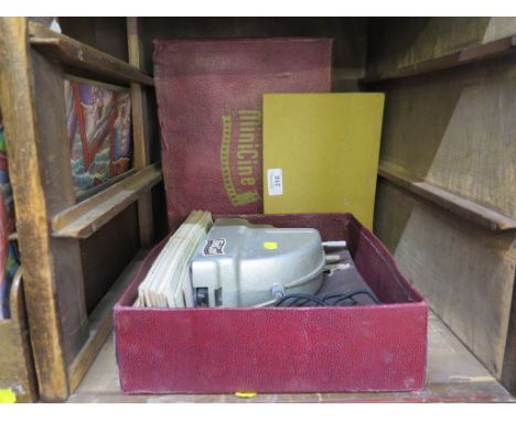 1950's Martin Lucas Minicine film projector and twenty films