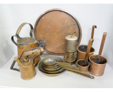A collection of copper and brass items including miners lamp engraved The Wolf Safety Lamp Co Wm Maurice Ltd Sheffield Wolf T
