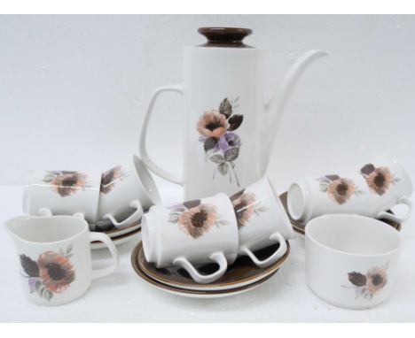 A bone china Royal Doulton dinnerware and tea service in the Carnation pattern comprising of plates, soup bowls, teapot, teac