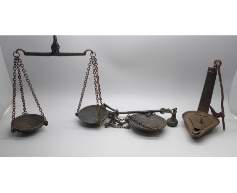 Two sets of hanging balance scales, c1900, and a Georgian Betty lamp