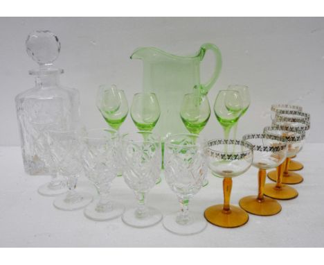 A collection of glass comprising of six green liquor glasses and pitcher, six crystal Sherry glasses and decanter and other s