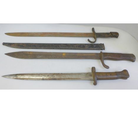 A British World War I bayonet lacking scabbard, together with two others, a/f   **PLEASE NOTE THIS LOT IS NOT ELIGIBLE FOR IN