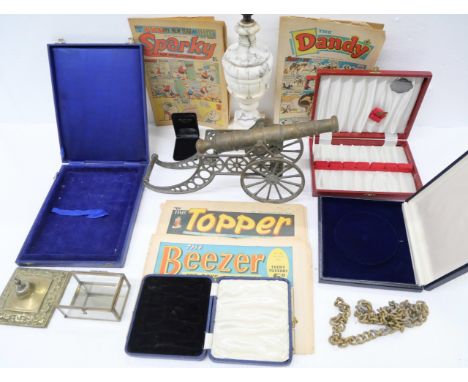 An assorted collection of items to include a large brass model cannon, small square brass stand, empty cutlery/jewellery boxe