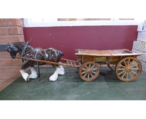 A Melba Ware horse and cart, with original receipt from 1977