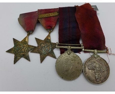 A set of four WWII medals including an Africa Service Medal and Africa Star with an 8th Army bar to N21620 S. Molofane