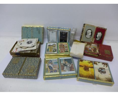 A collection of playing cards, including 1950's and 1960's, ten double packs and seven single, some lacking boxes