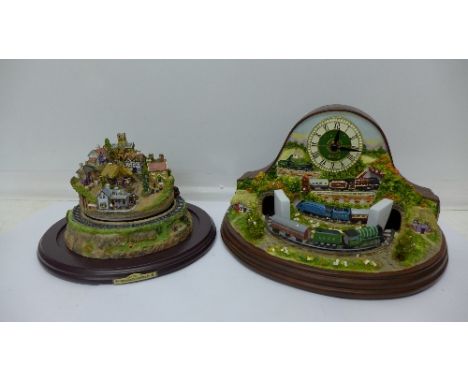 Two Bradford Exchange novelty locomotive clocks, Romance of Steam Flying Scotsman Village clock and a Hawthorne Village clock