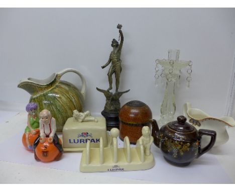 Lurpak advertising, a novelty salt and pepper, a tea pot, a spelter figure, a glass candlestick and a wooden pot