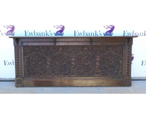 Carved oak panel, 63 x 152cm, together with a large oak overmantel, 49 x 204cm (2).       