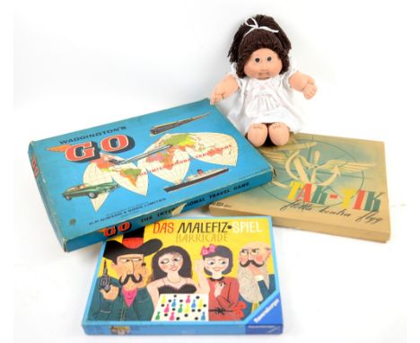 Cabbage patch doll and vintage board games.       