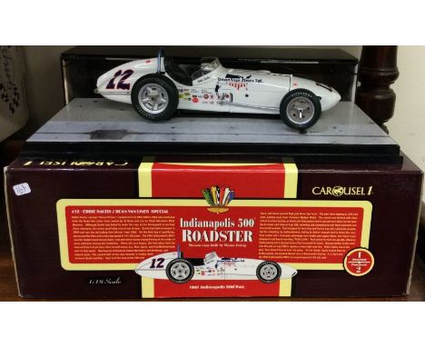 CAROUSEL 1: A 1:18 scale boxed model of an Indianapolis 500 Roadster. Est. £30 - £40.