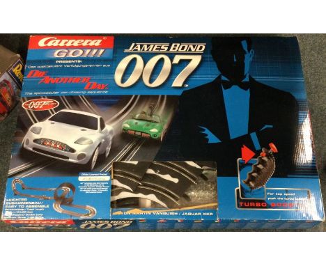 SCALEXTRIC: A James Bond 007 part set. Est. £20 - £30.