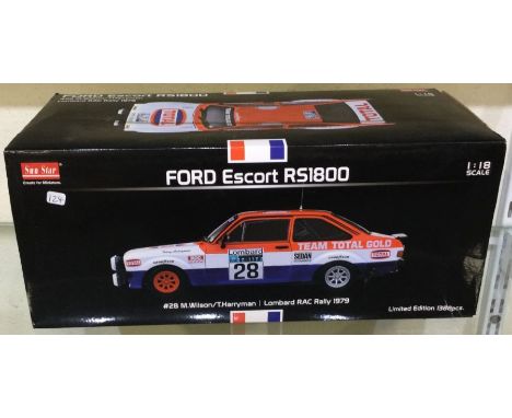 A 1:18 scale Limited Edition boxed model car of a Ford Escort RS1800. Est. £30 - £40.
