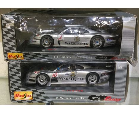 MAISTO: Two 1:18 scale boxed model cars of a Mercedes CLK. Est. £30 - £40.