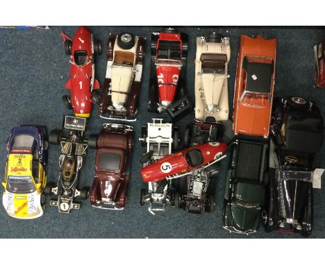 A collection of 1:18 scale unboxed model cars. Est. £20 - £30.