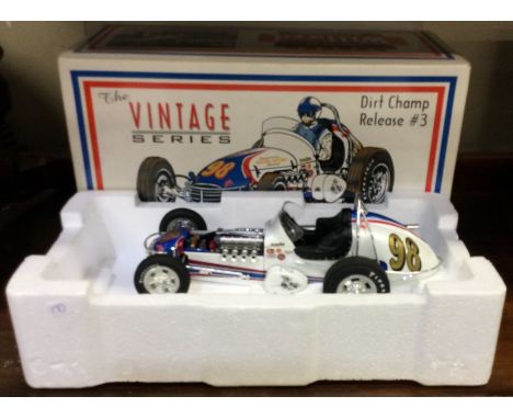 GMP: A 1:18 scale boxed model vehicle of a Parnelli Jones 1962 Willard Battery Spl. Dirt Champ. Est. £30 - £40.