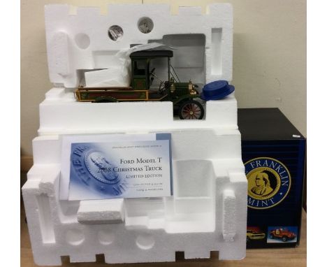 FRANKLIN MINT: A limited edition 1:16 scale boxed model of a Ford Model T 2008 Christmas Truck. Est. £30 - £40.