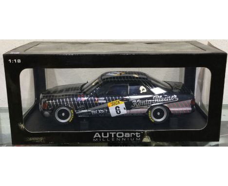 AUTOART: A 1:18 scale boxed model race car of a Mercedes-Benz 500SEC AMG. Est. £30 - £40.