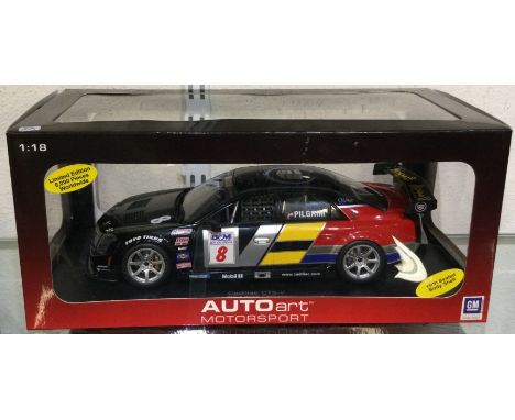 AUTOART: A 1:18 scale boxed model race car of a Cadillac CTS-V. Est. £30 - £40.