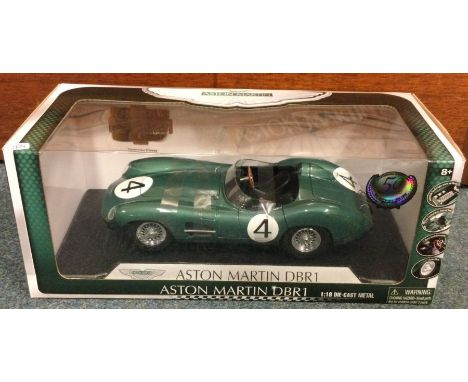 A 1:18 scale boxed die-cast model car of an Aston Martin DBR1. Est. £20 - £30.