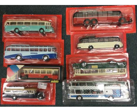 Eight 1:43 scale boxed model buses. Est. £20 - £30.