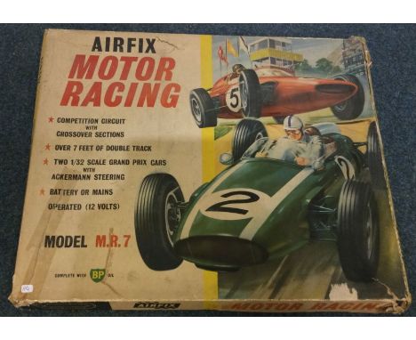AIRFIX: A competition circuit including two 1:32 scale Grand Prix cars. Est. £20 - £30.