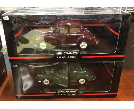 MINICHAMPS: Two 1:18 scale boxed Morris Minor model cars. Est. £30 - £40.