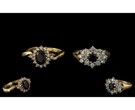 Two 9ct Gold CZ Dress Rings both fully hallmarked, ring size L and N. Gross Weight 5.2 grams.